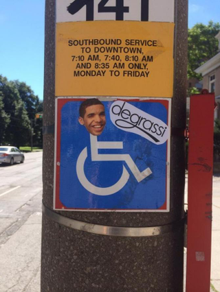 Illustration for article titled Someone Is Putting Drake’s Face on Wheelchair Signs in Toronto